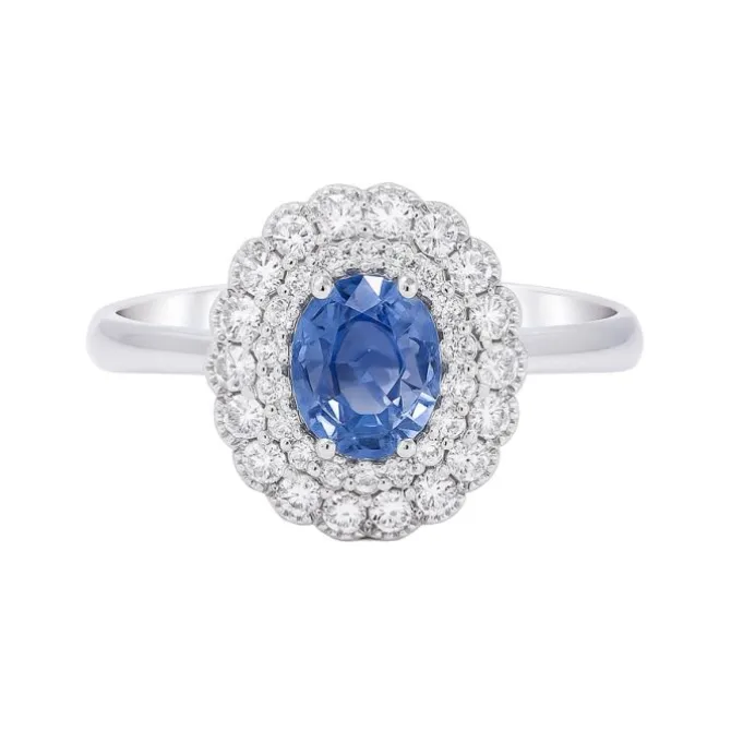 Anillo de oro blanco con diamantes 0.35 quilates y zafiro 0.82