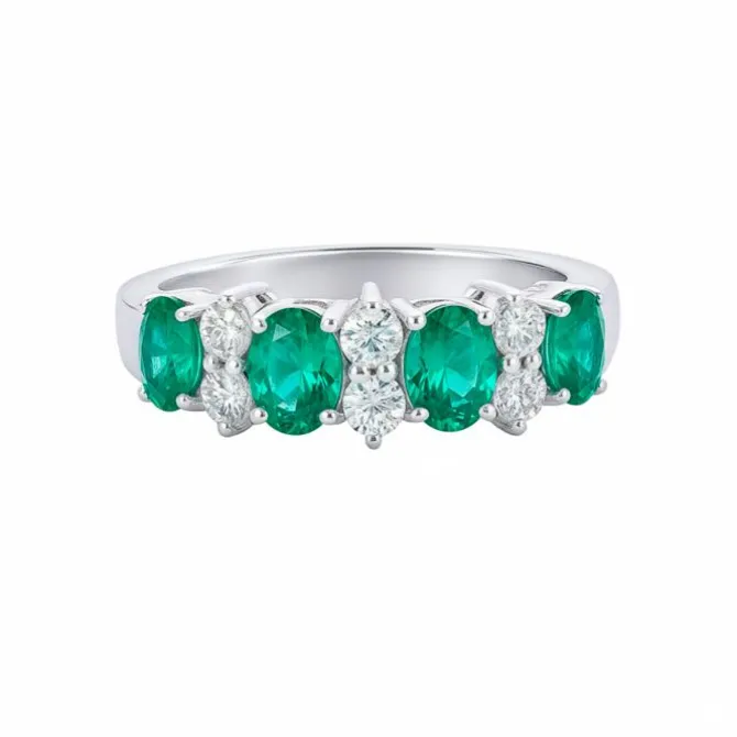 Anillo de oro blanco con diamantes 0,32 quilates y esmeraldas 1.10 quilates