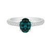 Anillo de oro blanco con diamantes 0,17 quilates y topacio London Blue