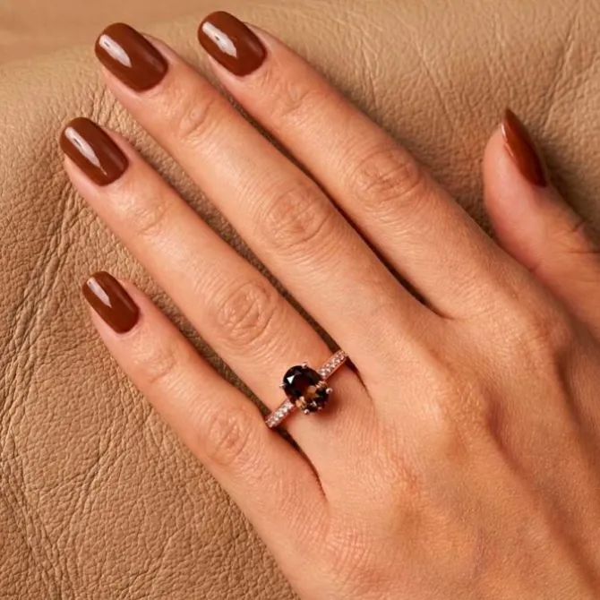 Anillo de oro rosa con diamantes 0.17 quilates y topacio marrón