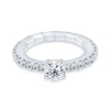 Anillo elástico de oro blanco con diamante central 0.50 quilates y diamantes 0.84 quilates