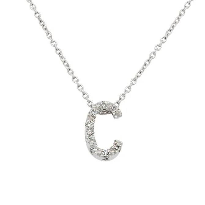 Colgante inicial de oro blanco y diamantes de 0.04 quilates
