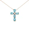Collar de cruz de oro rosa, diamantes 0,065 ct y topacios azules 2.40 ct