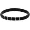 Pulsera elástica de cerámica negra, oro blanco y diamantes talla brillante con 0.36 quilates