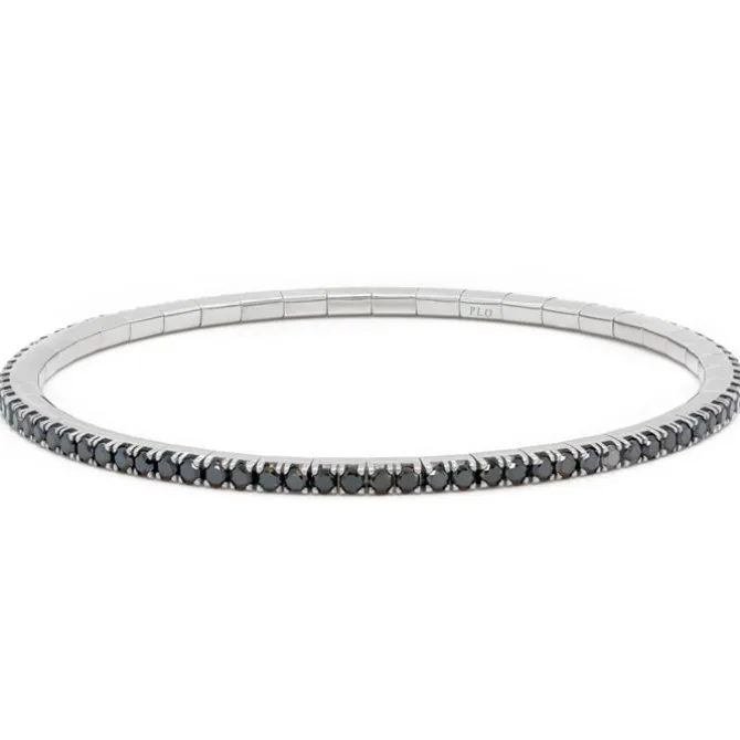 Pulsera riviere elástica en oro blanco y diamantes negros 2.60 quilates
